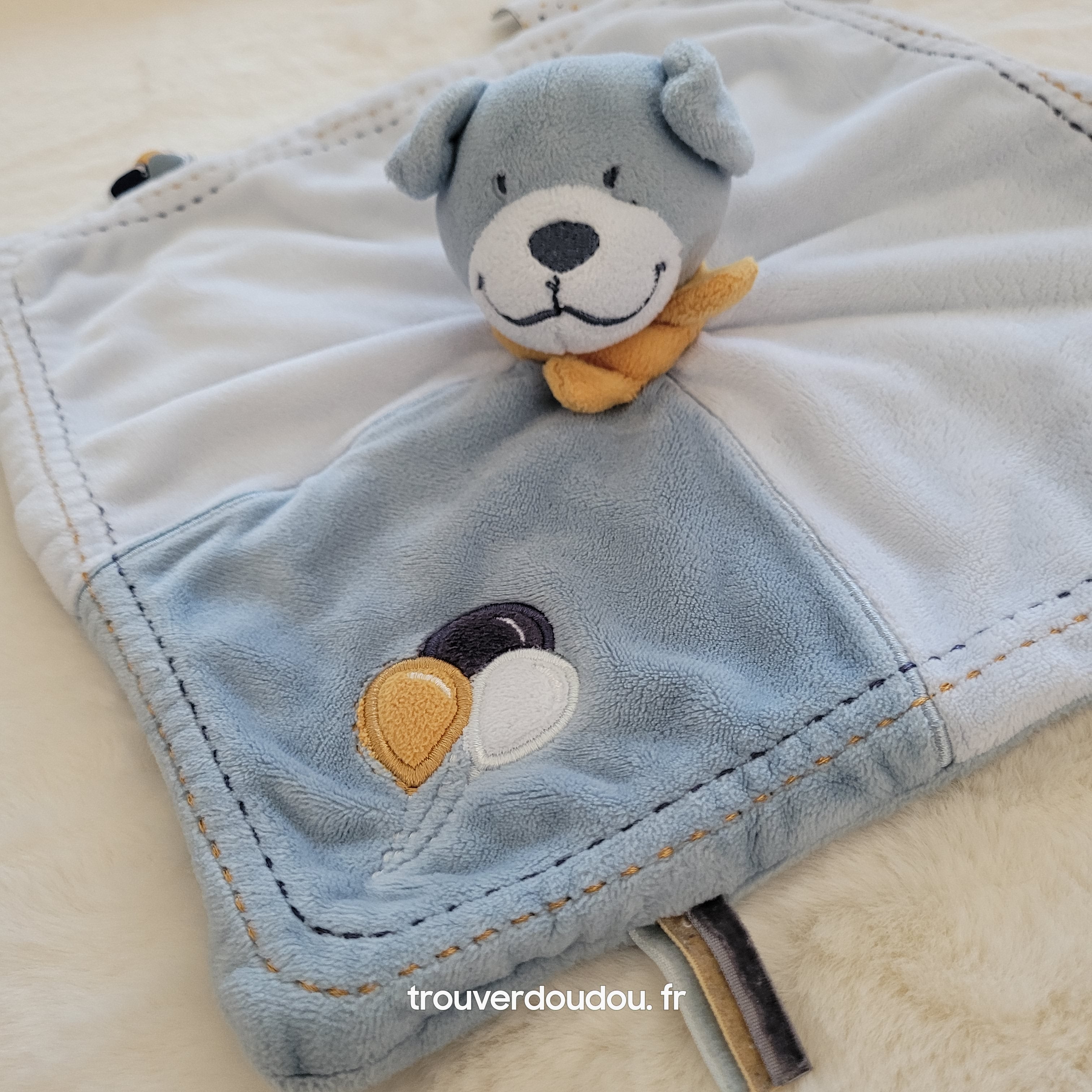 Doudou plat Tidou Chien Achille bleu broderie ballons - Noukie's Très bon état