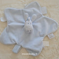 Doudou Plat Paco l'Âne Bleu Ciel en Forme de Fleur - Noukie's - Très Bon État